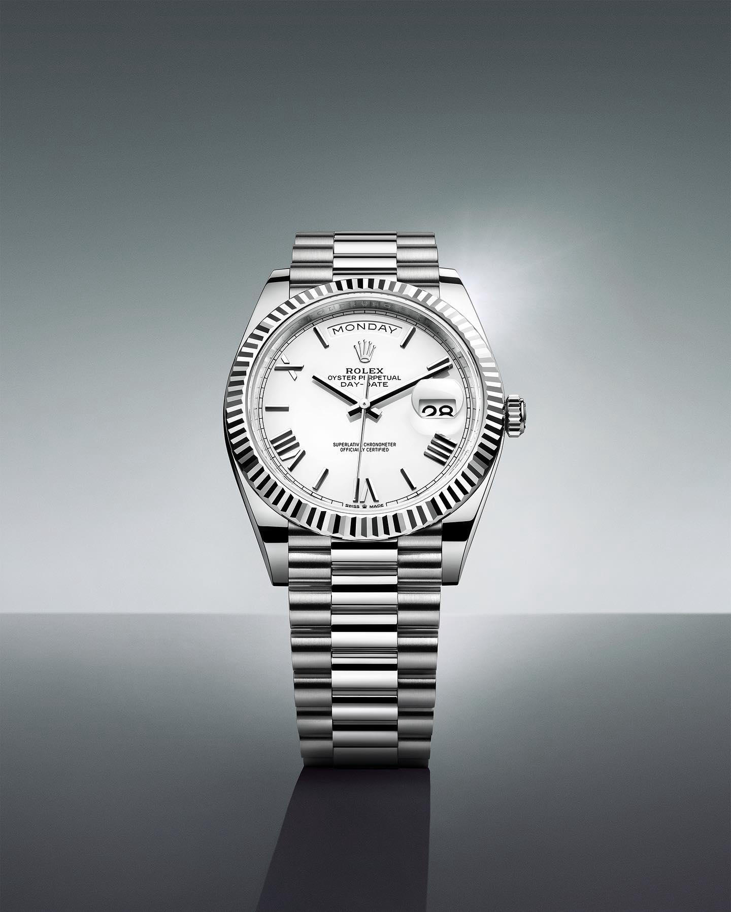 image  1 ROLEX - The Day-Date 40 in 950 platinum featuring a white dial with faceted, deconstructed Roman num