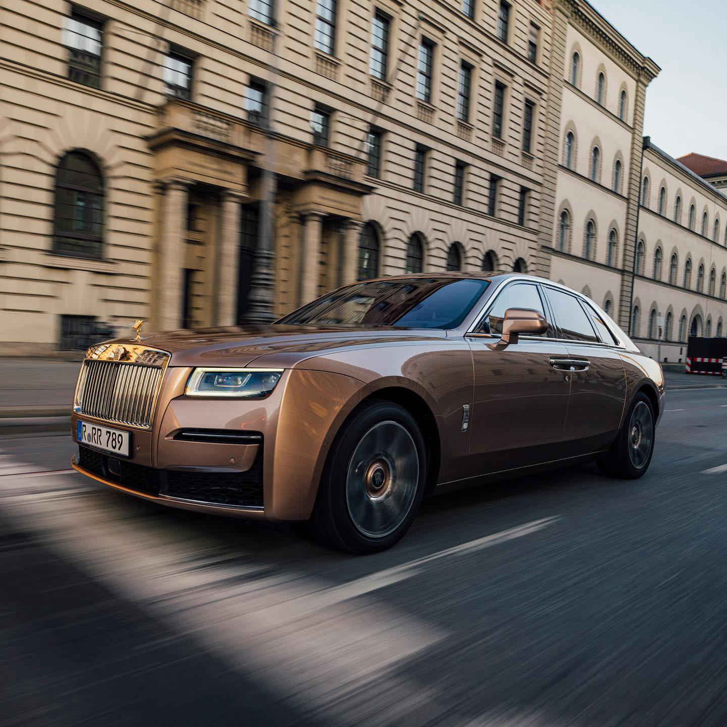 image  1 Rolls-Royce Motor Cars - Driving with effortless grace, this #Bespoke Ghost in Petra Gold exudes ele